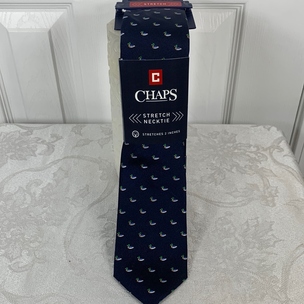NWT Chaps navy blue necktie with ducks on it. Stretches 2”